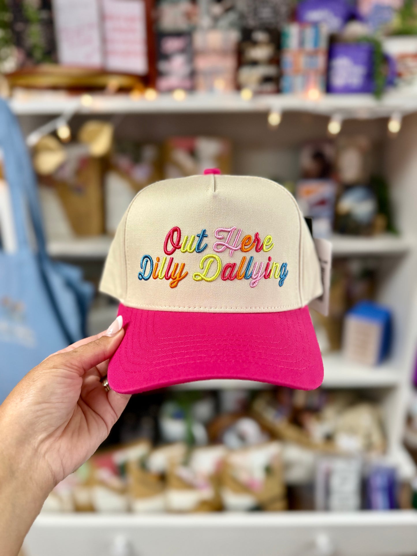 out here dilly dallying pink hat