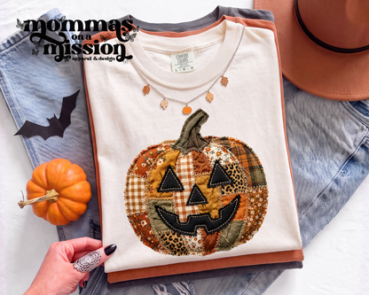 jack-o'-lantern face in patchwork