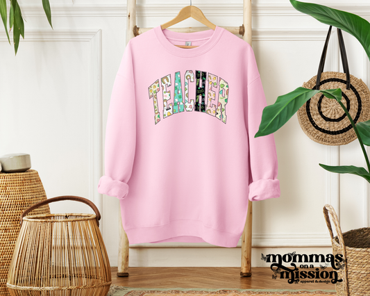 teacher in varsity font